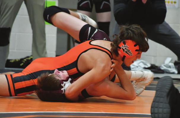 Cambridge’s Dierks Sayer earns a pin.