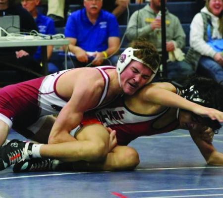 Hi-Line’s Wryston Brell battles for control on his way to a thirdplace finish at Elm Creek Friday.