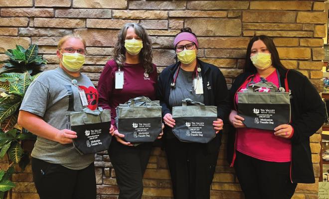 Tri Valley Health System Rural Health Clinic Nurses Twila Tyan, Jeri Powell, Brittany Alexander, and Staci Dack are pictured with the medication bags that will be given out to patients to help encourage patients to bring all their medications to their appointments.