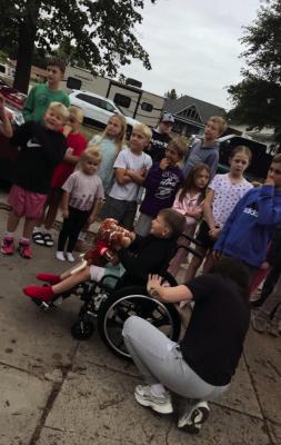 Oxford’s Drake Schellpeper is welcomed home by family and friends last week after a week-long stay in the hospital.