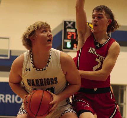 Arapahoe’s Cooper Wendland scored 14 to lead the Warriors at Medicine Valley Friday.