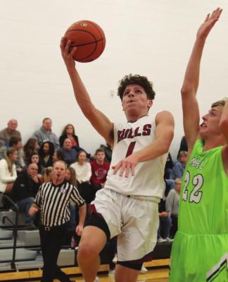 Hi-Line’s Ryker Evans scores past a MHC defender.