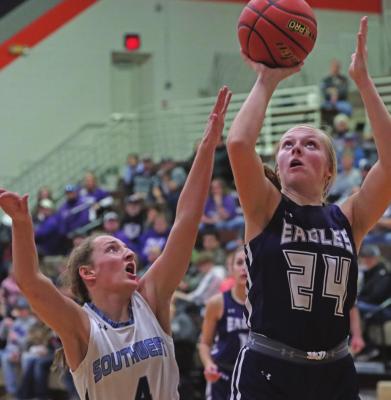 ABOVE: Southern Valley’s Brynn Baily scores inside around a Southwest defender. BELOW: Southwest’s Asia Gallegos drives into the paint.