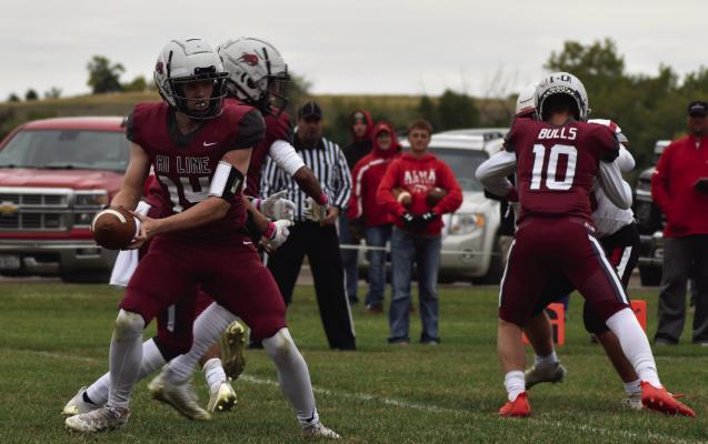 Hi-Line’s Zach Whittaker fakes a give against Alma Friday.