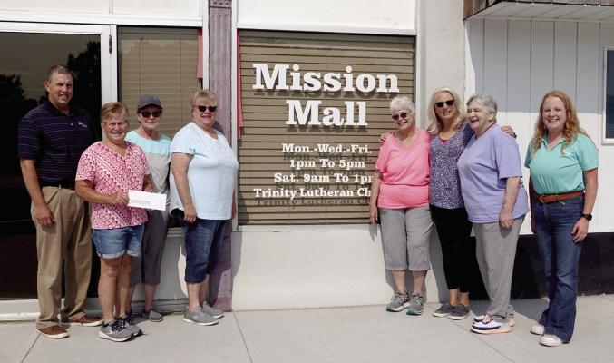 (L-R): Jeff Krejdl, CEO of Ag Valley Co-op, Connie Hoefs, Janet Hermes, Judy Collins, Joetta Glanzer, Paula Hinz, Margie Gardner, and Haley Roberts, VP of Marketing at Ag Valley Coop.