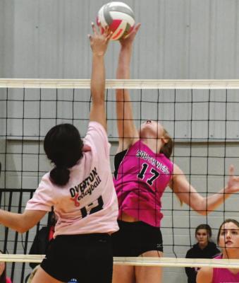 Southwest’s Bryn Lampe jousts at the net against Overton.
