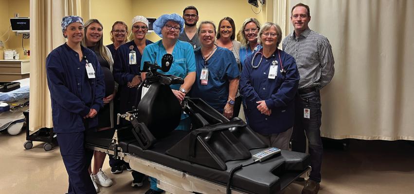 Pictured (left to right): Breanna Fiene RN, Tri Valley Medical Foundation Director Jamie Vontz, Staci Hopkins Surgical Tech, Kristi Shoemaker RN, Holly Lashmet CRNA, Chief Nursing Officer Clay Jordan, Janet Lacey RN, Tri Valley Health System CEO Jessica Fisher, Jana Koller RN, Kathy Vacura RN, and Dr. Ryan Carr.