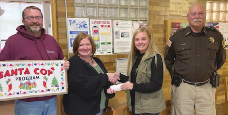 Elwood lions makes donation to santa Cop program