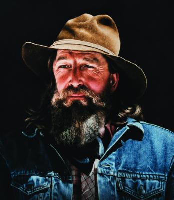GLEN L. WOLZEN