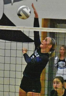 Southern Valley’s Krista Best attacks a ball against Cambridge Thursday.