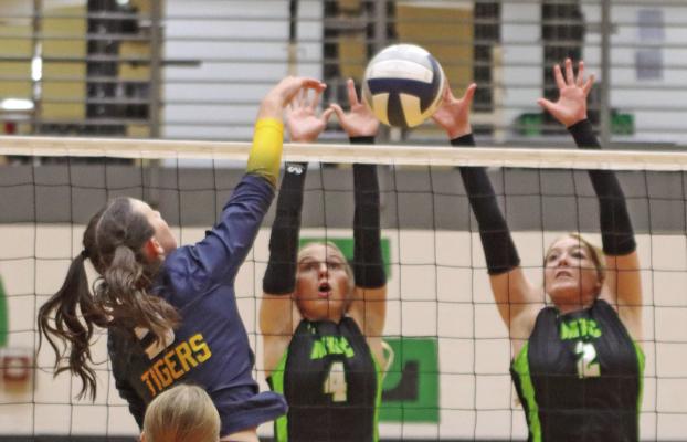 MHC’s Reagan Stengel and Kassidy Hatfield combine for a block.