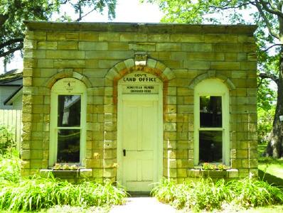 Bloomington Land Office-purchased by Pioneer Village in 1952. Each stone was numbered, before dismantling, moving, and rebuilding it at its new location. Photo from https:// www.penryfamily.com/surveying/bloomington.html.