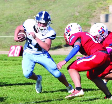 Southwest’s Conner Weaver tries to get around the Med Valley defense.
