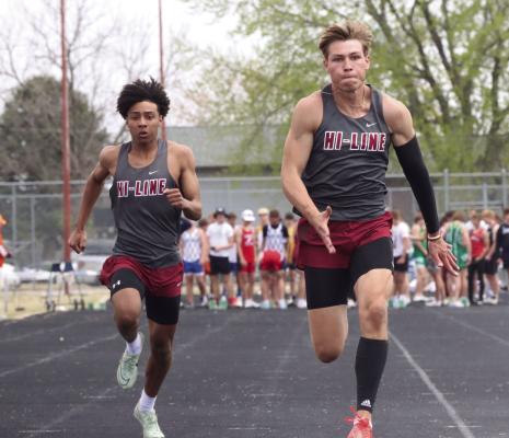 Hi-Line’s Asher Hecox (right) and Justin Ervin (left) each medaled in the 100 at the Jim Mather Invite in Arapahoe Wednesday.
