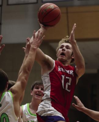 Medicine Valley’s Brody Senff rises for a shot in the lane.