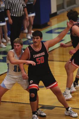 Cambridge’s Austin Harris posts up against Southwest’s Hunter Blume.