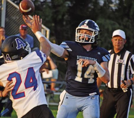 Southwest’s Houston Billeter lets a pass fly against Arthur County Friday.