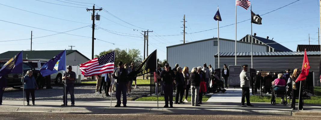 Members of the Patriot Guard participated in the dedication of the Elwood Veterans Memorial on May 2nd by making a flag wall.