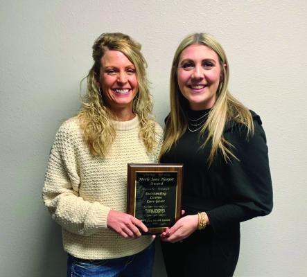 Pictured is Jamie Vontz, Tri Valley Medical Foundation Director, with licensed winner Tonya Koeppen