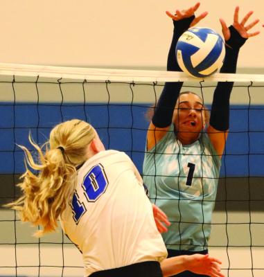Southwest’s Anastasia Gallegos rejects an Arapahoe attack.