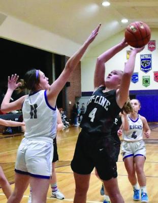Hi-Line’s Bentley Stubbs rises for a shot in the lane against Axtell.