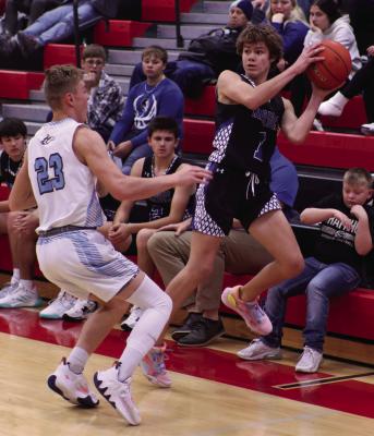 Arapahoe’s Kade Fisher saves a ball in against Southwest.