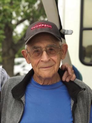 RUSSELL L. WOLF