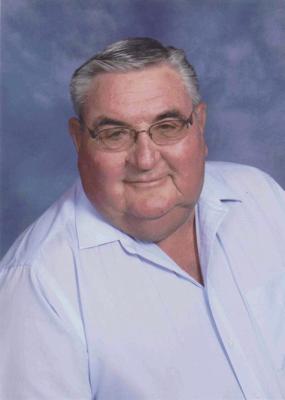 LARRY L. WARNER