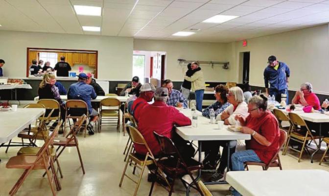Above: Meal fundraiser in Beaver City Community Building.