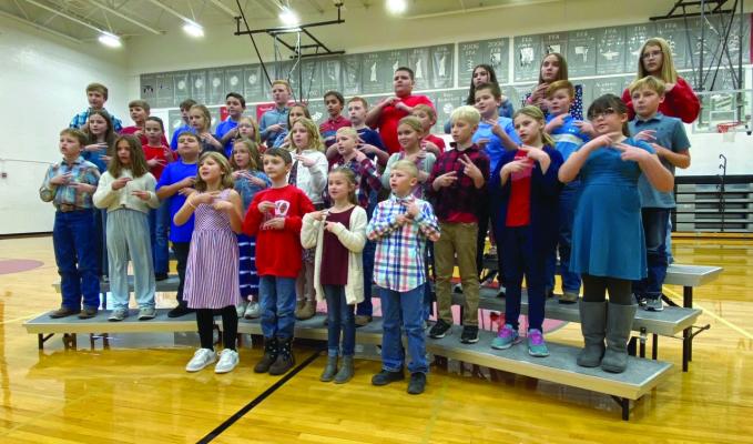 The Eustis third through fifth grade classes sang a patriotic song during the Veterans Day program held on Monday.