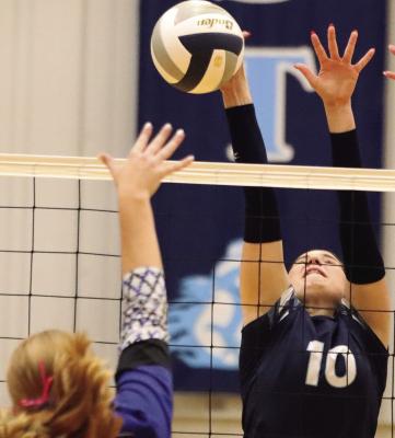 Southwest’s Aspen Billeter blocks an attack.