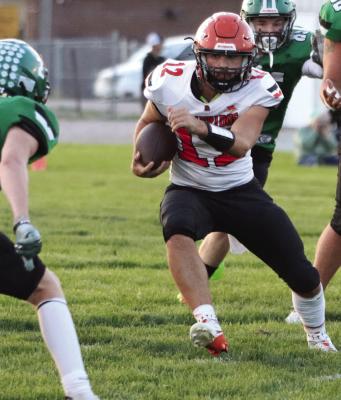 Loomis jumps Cambridge early, rolls away to hand Trojans first loss