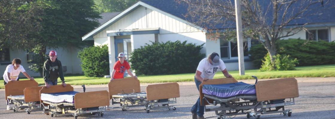 moving Hospital beds to former Coast to Coast building