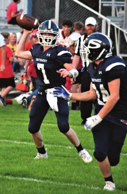 Southwest’s Nate Rippe fires a pass to a Southwest receiver.