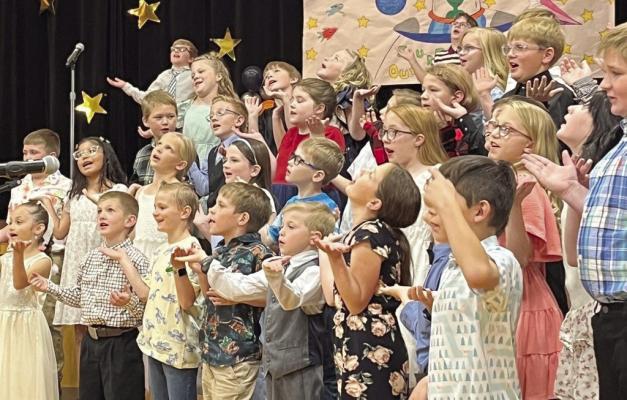 The Arapahoe elementary K-4 spring concert was held on April 30 at 7:00 p.m. at the Arapahoe-Holbrook Public School under the direction of Mrs. Valerie Leising. It was a cute program with songs about going to outer space. There might have been a few aliens in the program.