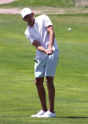 Maywood/Hayes Center’s Oliver Anders chips in for birdie on the par 3 sixth at Curtis Tuesday.