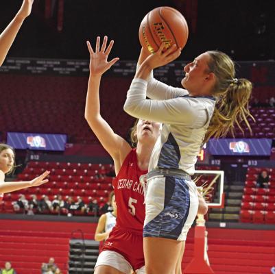 Southwest’s Allison Van Pelt (above) and Kyra Nelms (below) fire jumpshots.