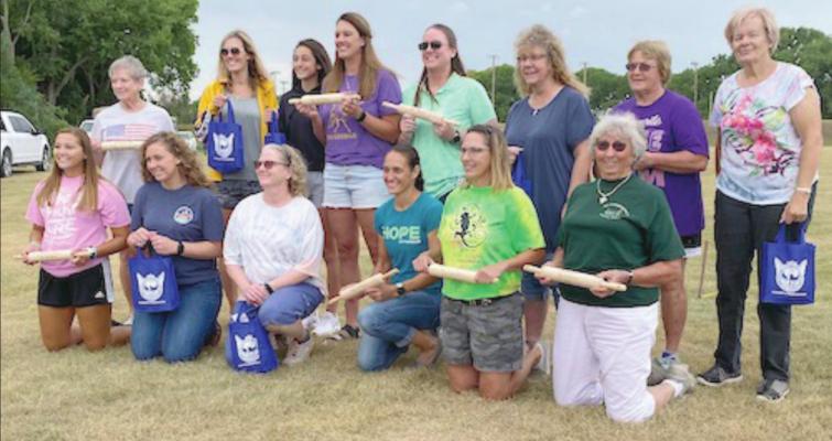 First and second place winners in the rolling pin throwing contest. Pictured l to r, back row: Eileen Herrmann, Lindsey Foster, Libby Foster, Monica Cole, Kim Barnett, Tammy Brewster, Millie Cuellar, Elsie Reiners. Front row: Sydney Reichert, Savannah Schmitt, Teresa Foster, Stacy Blomstedt, Pam Reichert, Myrna Haag.
