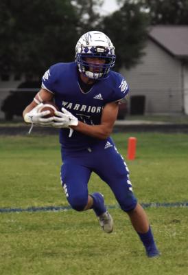 Wake-up call for Arapahoe in loss to Lawrence-Nelson