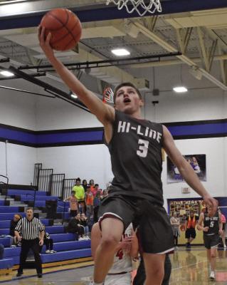 Hi-Line’s Treyton Evans glides in for a layup.