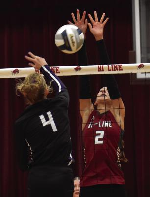 Hi-Line’s Lauryn Ruda blocks back an attack from Southern Valley’s Haisley McQuiston.