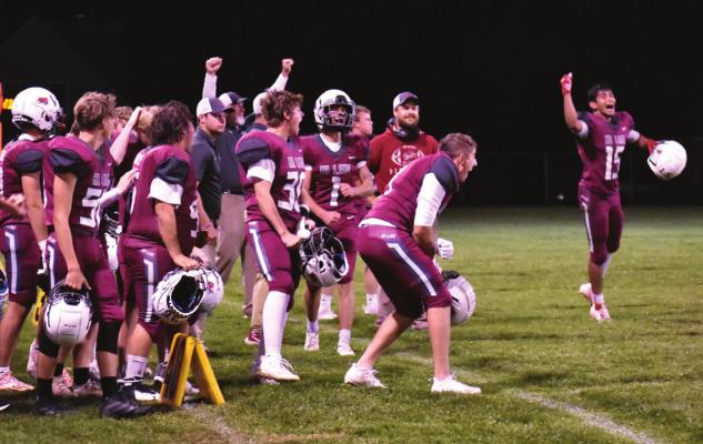 The Hi-Line football team celebrates the final play during a 10-point victory over Dundy County-Stratton Friday.