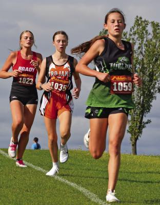 Maywood-Hayes Center’s Carly Softley and Cambridge’s Lydia McGowen finished second and third at the Arapahoe Cross Country Invite Thursday.