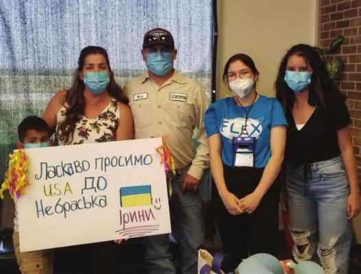 Arapahoe foreign exchange student Iryna Kuliieva (second from right) is pictured with her host family, the Calamacos.