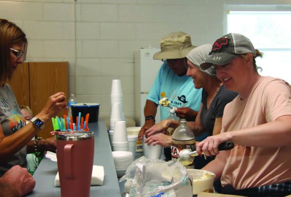 The Southwest School Foundation provides rootbeer floats for community members.