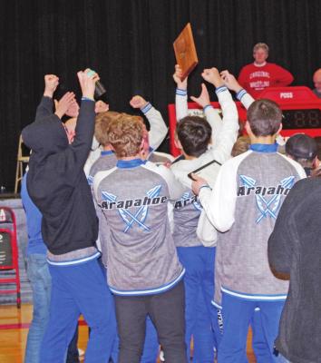 The Arapahoe wrestling team celebrated its first RPAC Tournament Title Friday. Complete results and more photos can be found on Pages B2 and B3.