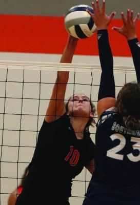 Cambridge’s Jacey Kent led the Trojans in kills in both ends of a triangular at Bertrand Thursday night.