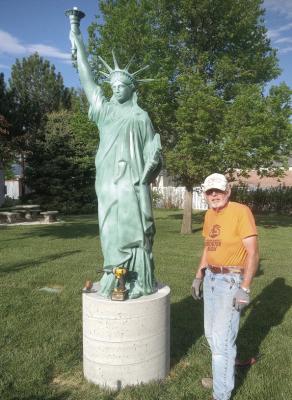Matt Faw of Arapahoe purchased this Statue of Liberty and donated it to the Arapahoe community and another one for Cambridge. The one in Arapahoe was placed by the Veterans Memorial Wall in downtown Arapahoe by Gary Schievelbein. You can see the one in Cambridge at the Cambridge Museum.
