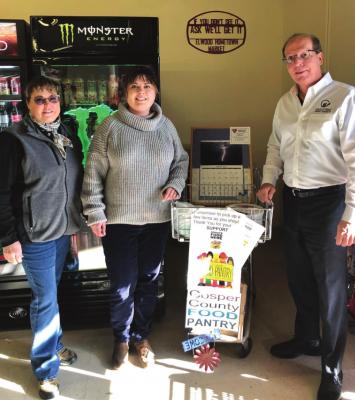 Pictured L to R: Jodi Klassen, Gosper County Food Pantry coordinator; LeahAnn Brell, Brell Realty &amp; Auction; Terry Galloway, Galloway Financial Advisors