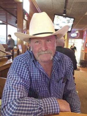 KENNETH E. COZAD